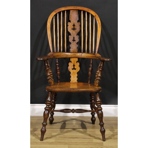 1578 - A 19th century Yorkshire yew, beech, ash and elm Windsor elbow chair, shaped and pierced splat, sadd... 