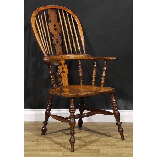 1578 - A 19th century Yorkshire yew, beech, ash and elm Windsor elbow chair, shaped and pierced splat, sadd... 