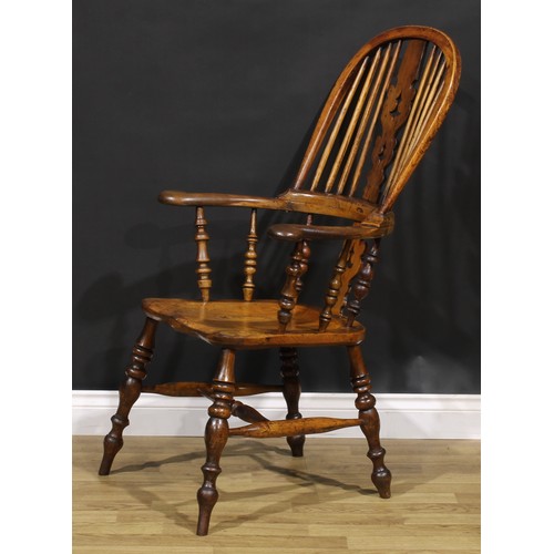 1578 - A 19th century Yorkshire yew, beech, ash and elm Windsor elbow chair, shaped and pierced splat, sadd... 