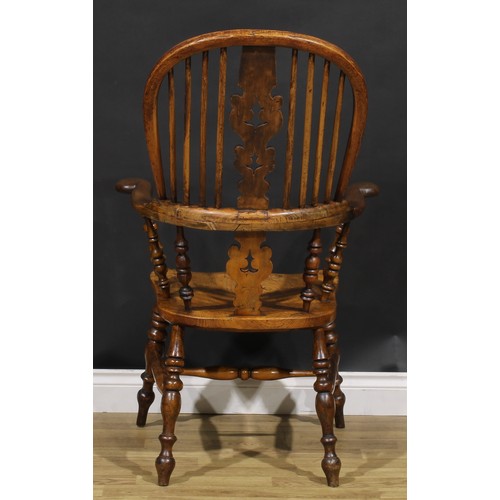 1578 - A 19th century Yorkshire yew, beech, ash and elm Windsor elbow chair, shaped and pierced splat, sadd... 