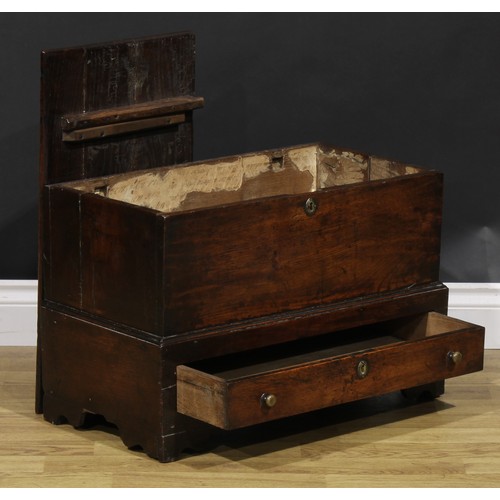 2076 - An 18th century oak coffer bach, pivot-hinged top above a long drawer, 41cm high, 62cm wide, 33cm de... 