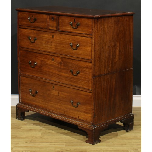 2039 - An unusual George III mahogany chest, rectangular top above an idiosyncratic arrangement of three sh... 