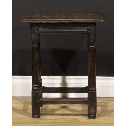 2079 - An early 18th century oak joint stool, rectangular top above a moulded frieze, turner and blocked le... 