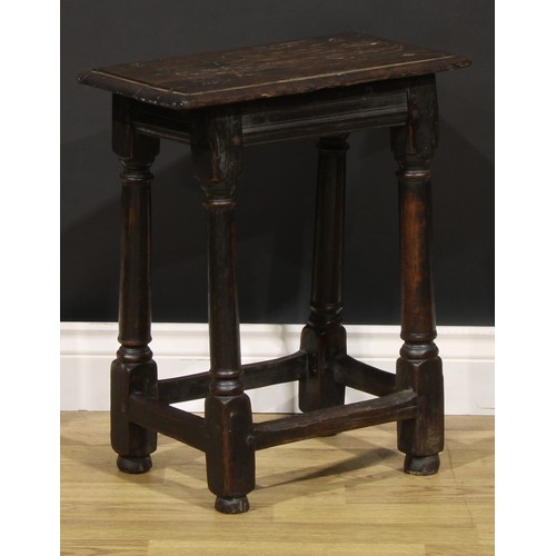 2079 - An early 18th century oak joint stool, rectangular top above a moulded frieze, turner and blocked le... 