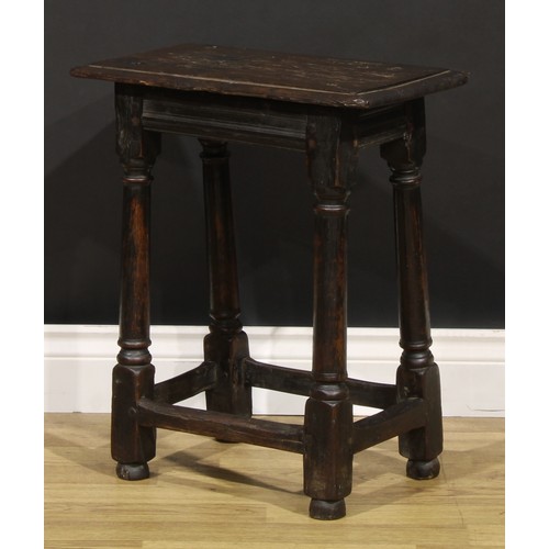 2079 - An early 18th century oak joint stool, rectangular top above a moulded frieze, turner and blocked le... 