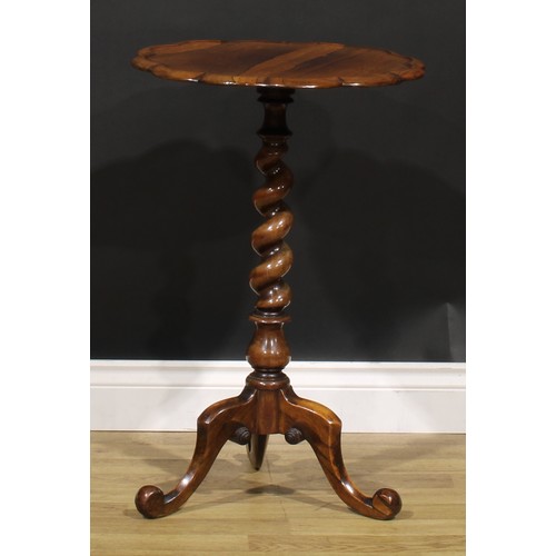 1910 - A Victorian rosewood tripod wine table, dished shaped circular top, spirally turned pillar, cabriole... 