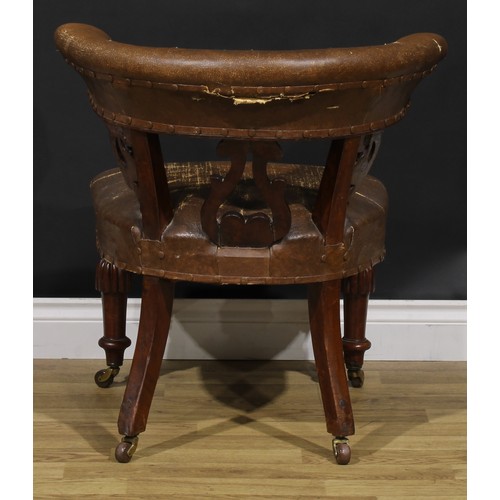 2080 - A Victorian mahogany club or desk chair, stuffed-over upholstery, turned legs, ceramic casters, 73cm... 