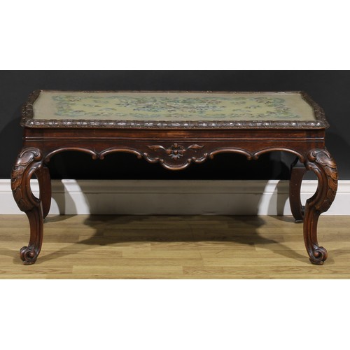 1909 - A Victorian mahogany low sitting room table, shaped rectangular top with glazed woolwork panel, shap... 