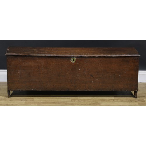 2114 - An 18th century oak six-plank chest, hinged top enclosing a till and a drawer, 47cm high, 120cm wide... 