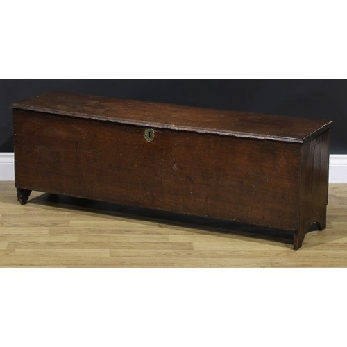 2114 - An 18th century oak six-plank chest, hinged top enclosing a till and a drawer, 47cm high, 120cm wide... 