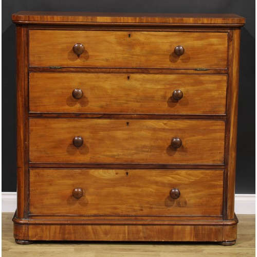 2040 - An unusual Victorian mahogany chest, fall front enclosing four sliding linen trays, above three long... 