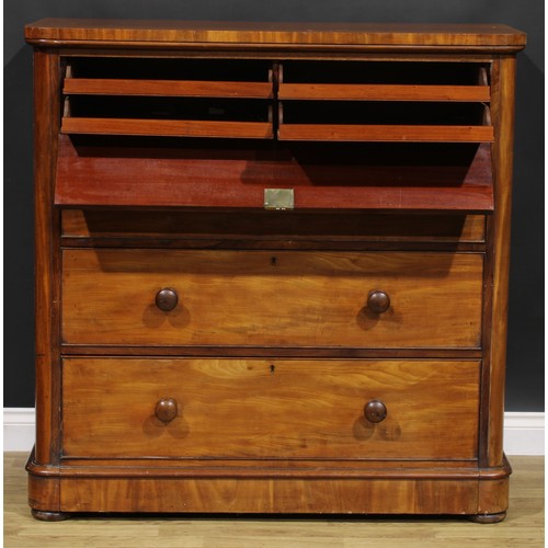 2040 - An unusual Victorian mahogany chest, fall front enclosing four sliding linen trays, above three long... 