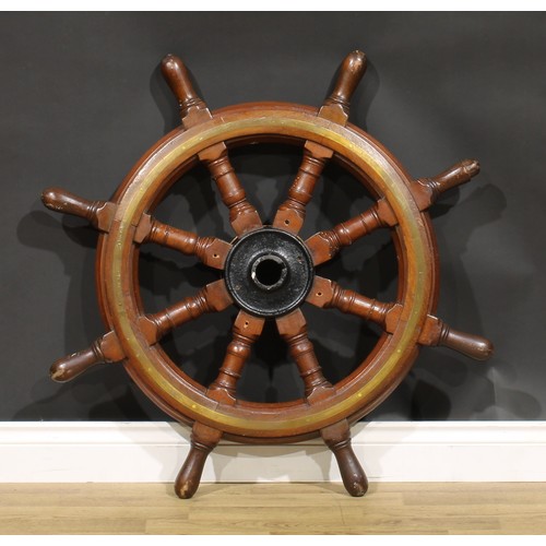 2116 - An early 20th century brass bound oak ship’s wheel, iron hub, turned spokes, 93cm diameter