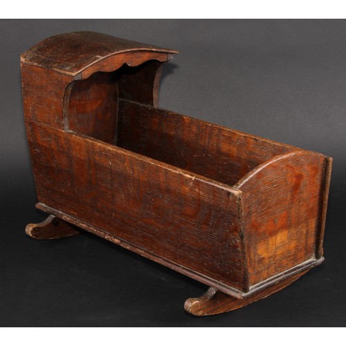 2052 - Miniature Furniture - an early 20th century oak folk art rocking crib, of traditional primitive form... 