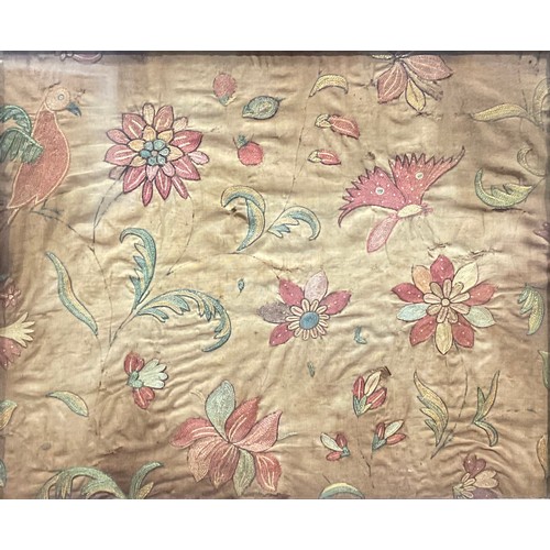 2133 - A pair of late 18th century needlework panels, embroidered in colourful silk threads with flowers an... 