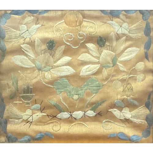 2133 - A pair of late 18th century needlework panels, embroidered in colourful silk threads with flowers an... 