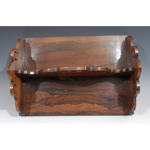 2100 - A William IV rosewood rectangular book carrier, double-sided, pierced and shaped end supports and di... 