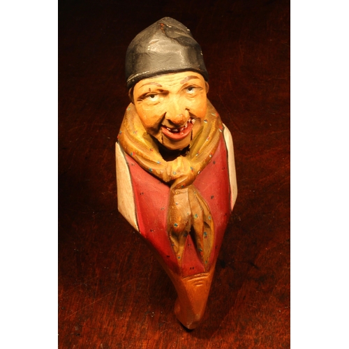 1087 - Nutcrackers - a Black Forest novelty lever-action nut cracker, carved and painted as a gypsy wearing... 