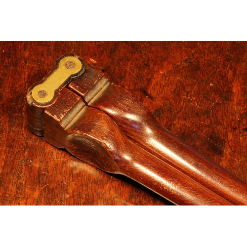 1073 - Nutcrackers - a 19th century rosewood lever-action nut cracker, brass spanner-form hinge, 23cm long