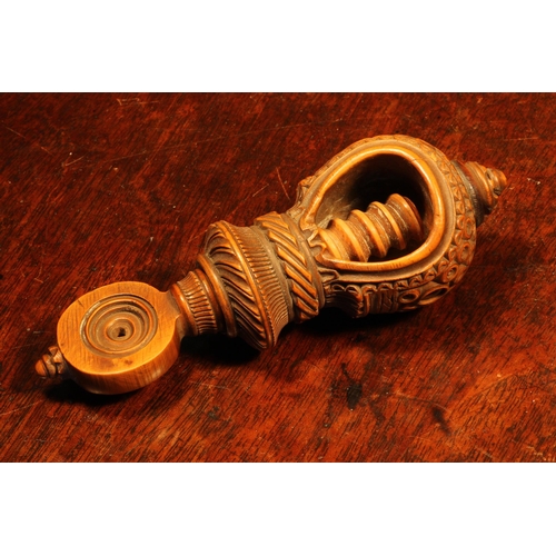 1069 - Nutcrackers - a 19th century boxwood screw-action nut cracker, drilled and chip-carved decoration, 1... 