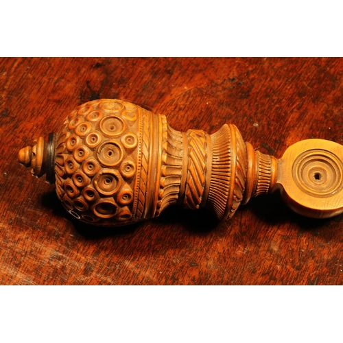 1069 - Nutcrackers - a 19th century boxwood screw-action nut cracker, drilled and chip-carved decoration, 1... 