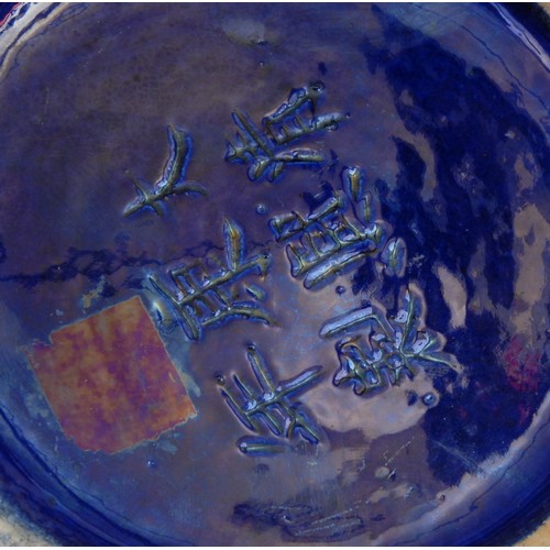 255 - A Chinese ovoid vase, in the manner of Wang Bing Rong, decorated in tones of green, brown and yellow... 