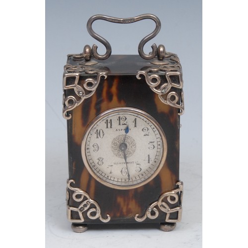 2060 - Asprey & Co , A late Victorian silver-mounted tortoiseshell boudoir clock timepiece,  silvered dial,... 