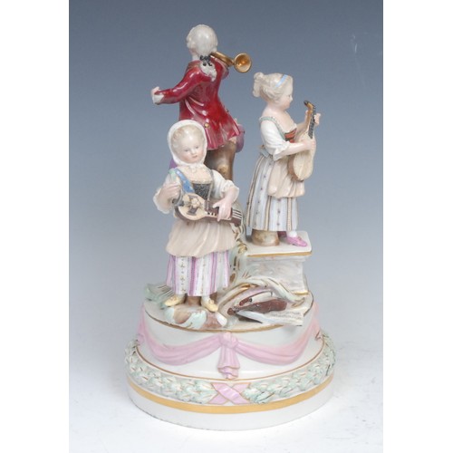 152 - A 19th century Meissen figure group centrepiece, as four musicians, each outward-facing standing on ... 