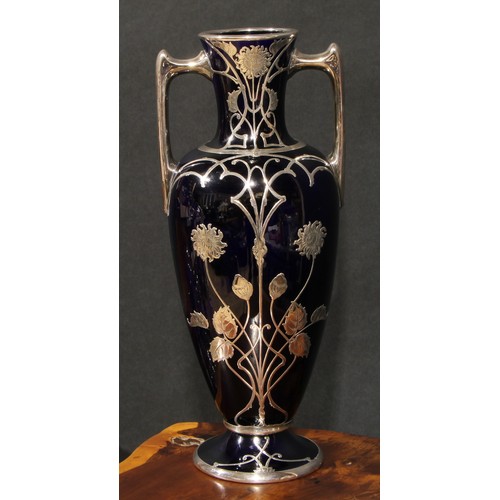 17 - An Art Nouveau silver mounted cobalt blue ovoid vase, pierced and engraved with stylised flowers on ... 