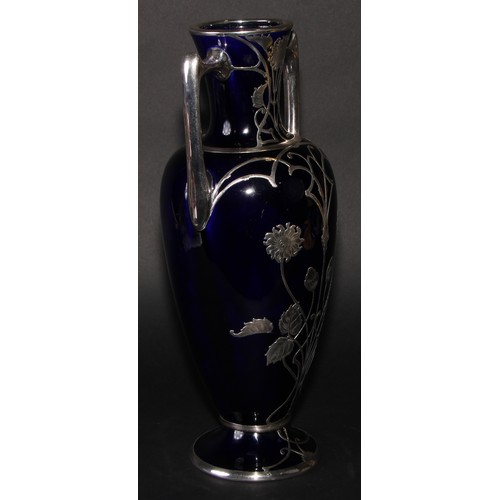17 - An Art Nouveau silver mounted cobalt blue ovoid vase, pierced and engraved with stylised flowers on ... 