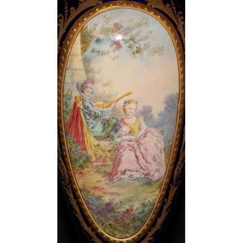 167 - A pair of French gilt metal mounted porcelain slender ovoid vases, painted in the manner of Sèvres w... 