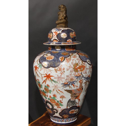 236 - A large Japanese ovoid jar, painted in the Chinese taste in the Imari palette with phoenix and flowe... 