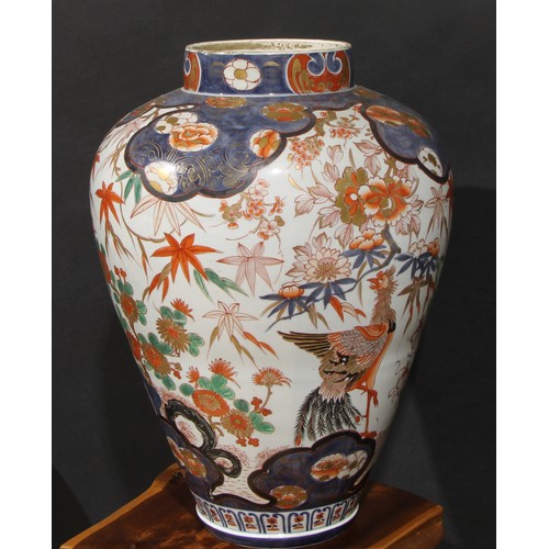 236 - A large Japanese ovoid jar, painted in the Chinese taste in the Imari palette with phoenix and flowe... 