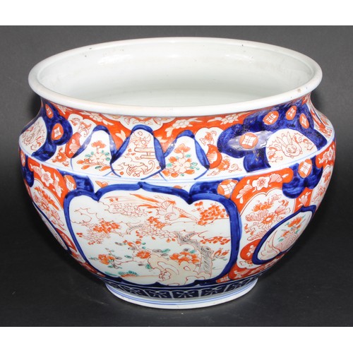 228 - A Japanese ovoid jardiniere, typically painted in the Imari palette, 29.5cm diameter, Meiji period