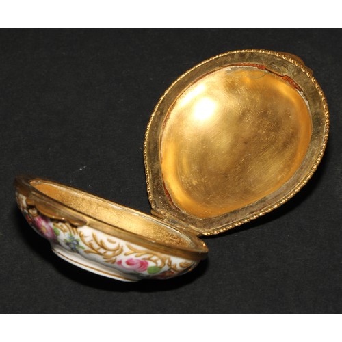 1183 - A Continental porcelain gilt metal mounted shell shaped snuff box, painted in polychrome with Deutsc... 