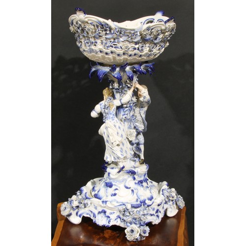 160 - A Meissen figural table centrepiece, modelled with a courting couple and glazed in tones of blue, 58... 