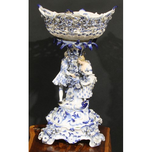 160 - A Meissen figural table centrepiece, modelled with a courting couple and glazed in tones of blue, 58... 