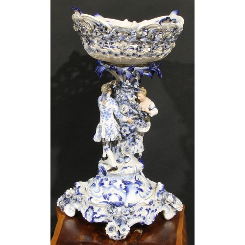 160 - A Meissen figural table centrepiece, modelled with a courting couple and glazed in tones of blue, 58... 
