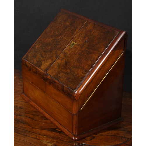 2153 - A Victorian walnut table-top desk box, hinged sloping front with twin covers enclosing an interior f... 