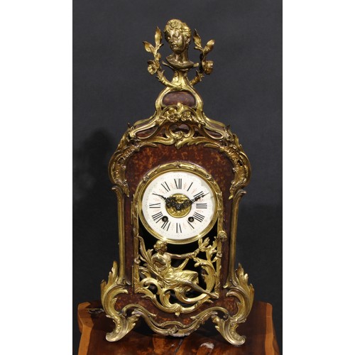 2062 - A Louis XV style gilt metal mounted faux tortoiseshell mantel clock, ivorine chapter ring, Roman num... 