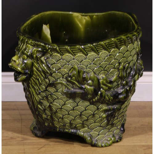 15 - A substantial 19th century art pottery jardiniere, moulded in the Japanese taste with dragons, grote... 
