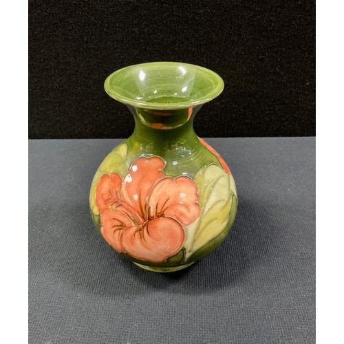 2 - A Moorcroft pottery Hibiscus pattern vase, flared lip, green ground, 13cm high, with Potter to the L... 
