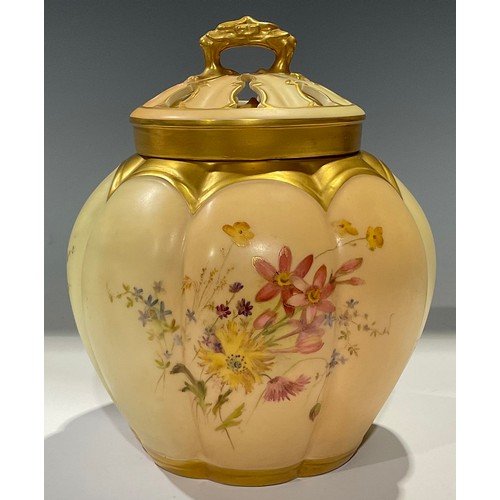 65 - A Royal Worcester Blush Ivory lobed ovoid pot pourri vase and cover, painted with summer flowers on ... 