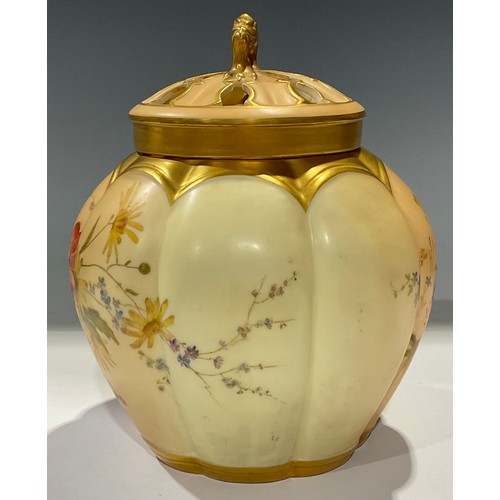 65 - A Royal Worcester Blush Ivory lobed ovoid pot pourri vase and cover, painted with summer flowers on ... 