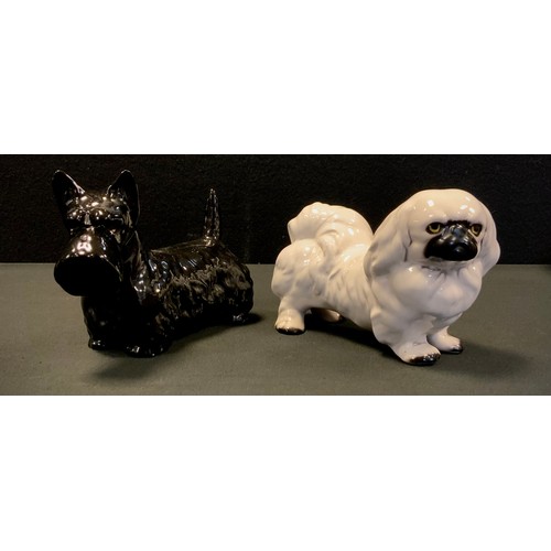 14 - A Beswick model, West Highland Terrier, black gloss, printed marks, another Pekinese , white gloss, ... 