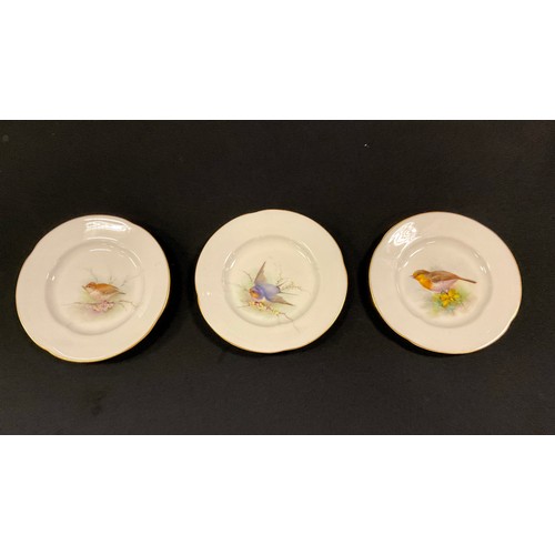 16 - A pair of Royal Worcester quarter lobbed miniature cabinet plates, painted with a Swallow resting on... 
