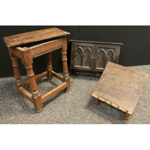 53 - An early 19th century oak joint stool, 55.5cm high x 46cm x 28.5cm;  a gothic revival wall cupboard,... 