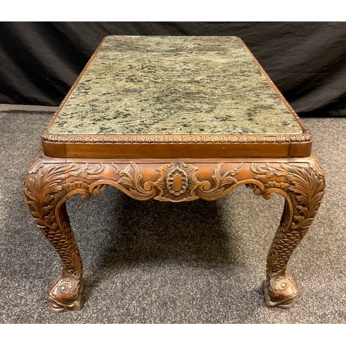 63 - An Oriental Chinoiserie carved walnut ‘Opium’ or coffee table, inset green marble rounded rectangula... 