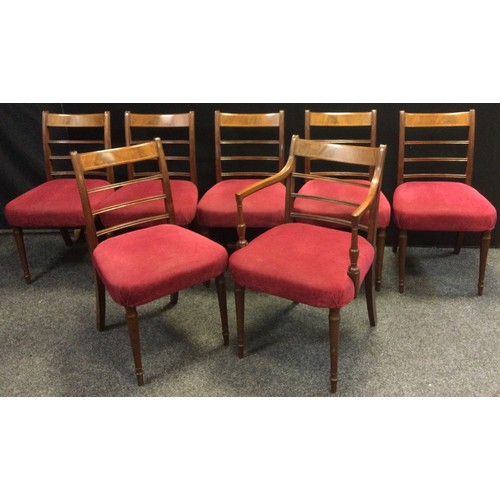 73 - A set of seven early to mid century reproduction mahogany dining chairs, including six chairs and si... 