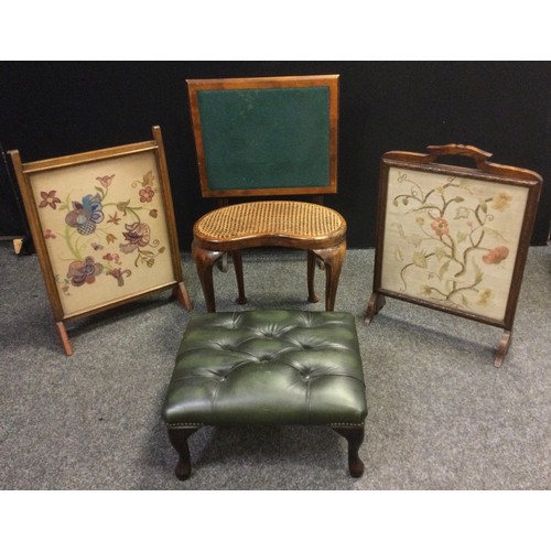 77 - An Edwardian campaign games table, 68.5cm high x 61.5cm wide x 50.5cm;  an early 20th century oak fi... 